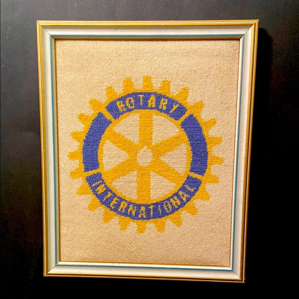 Framed, needlepoint of Rotary International logo service organization 9 x 11”